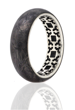 Ring with forged carbon fiber exterior with sterling silver square pattern interior.