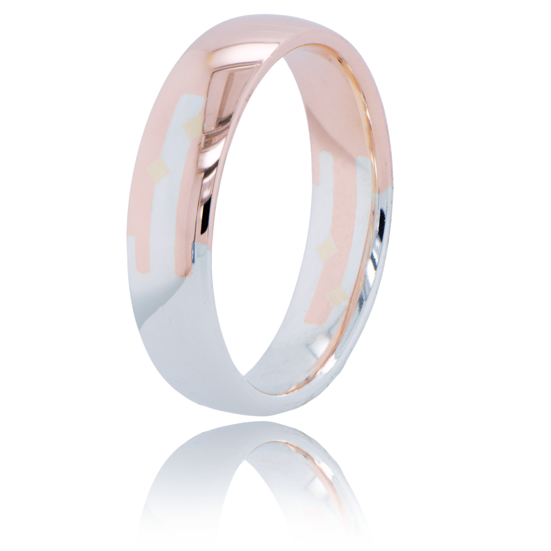 Radius ring made from 50% gold and 50% silver connected with a rectangular joint and two gold pins.