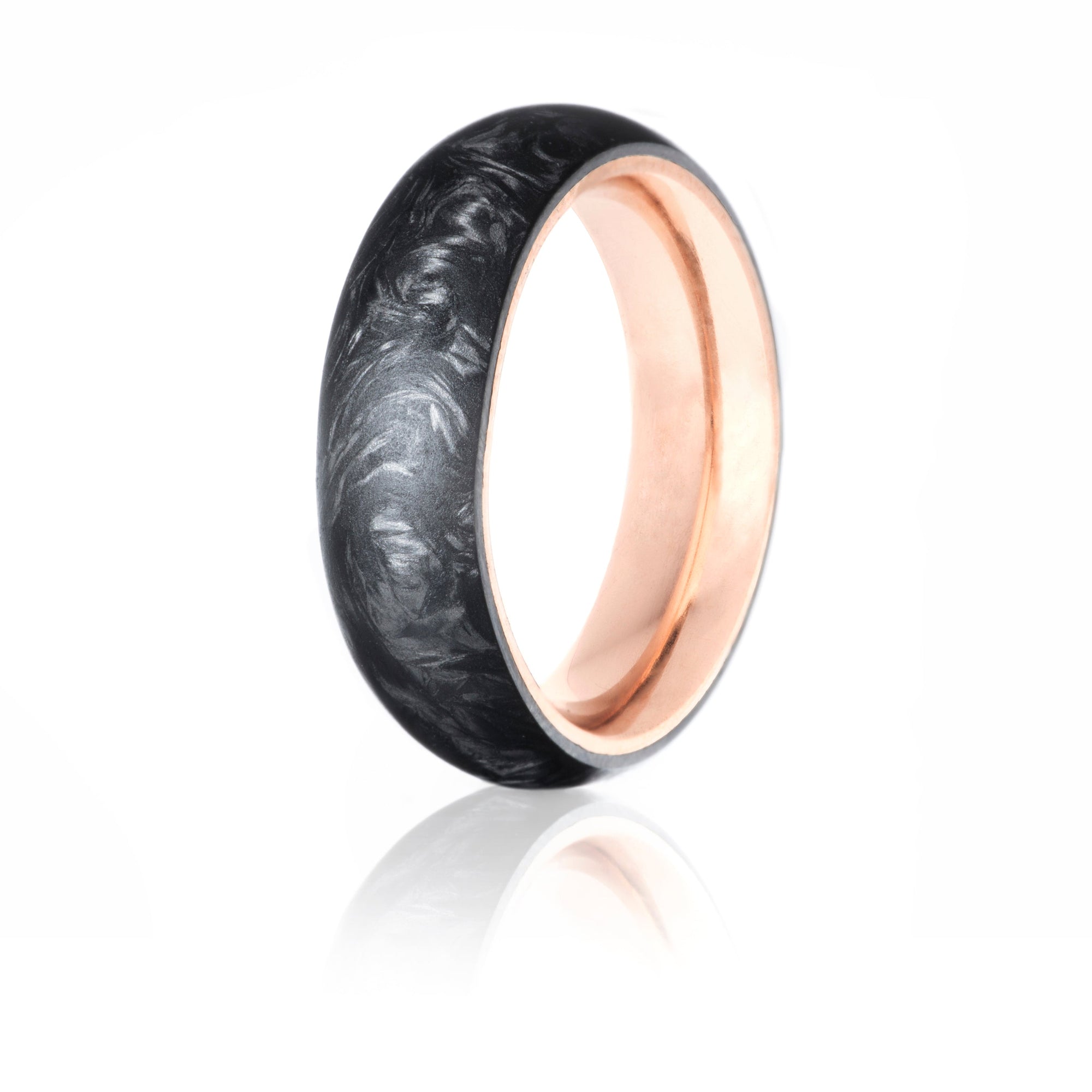 Forged Carbon radius ring with rose gold interior.