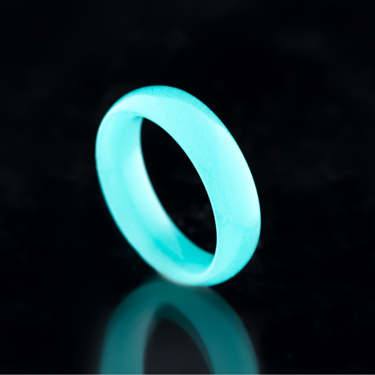 Turquoise Glow Ring made entirely from proprietary glow polymer. 
