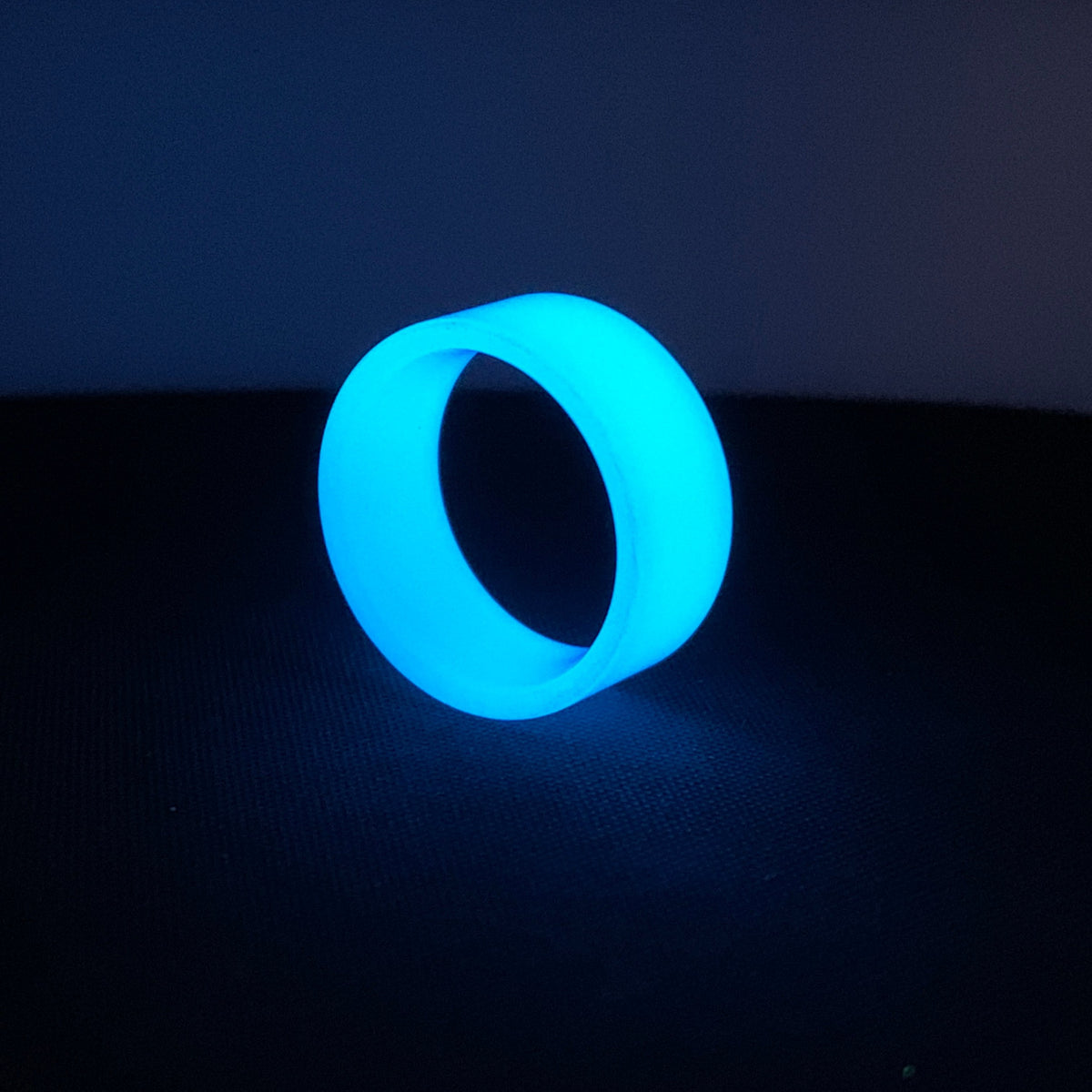 Blue Glow Ring made entirely from proprietary glow polymer.