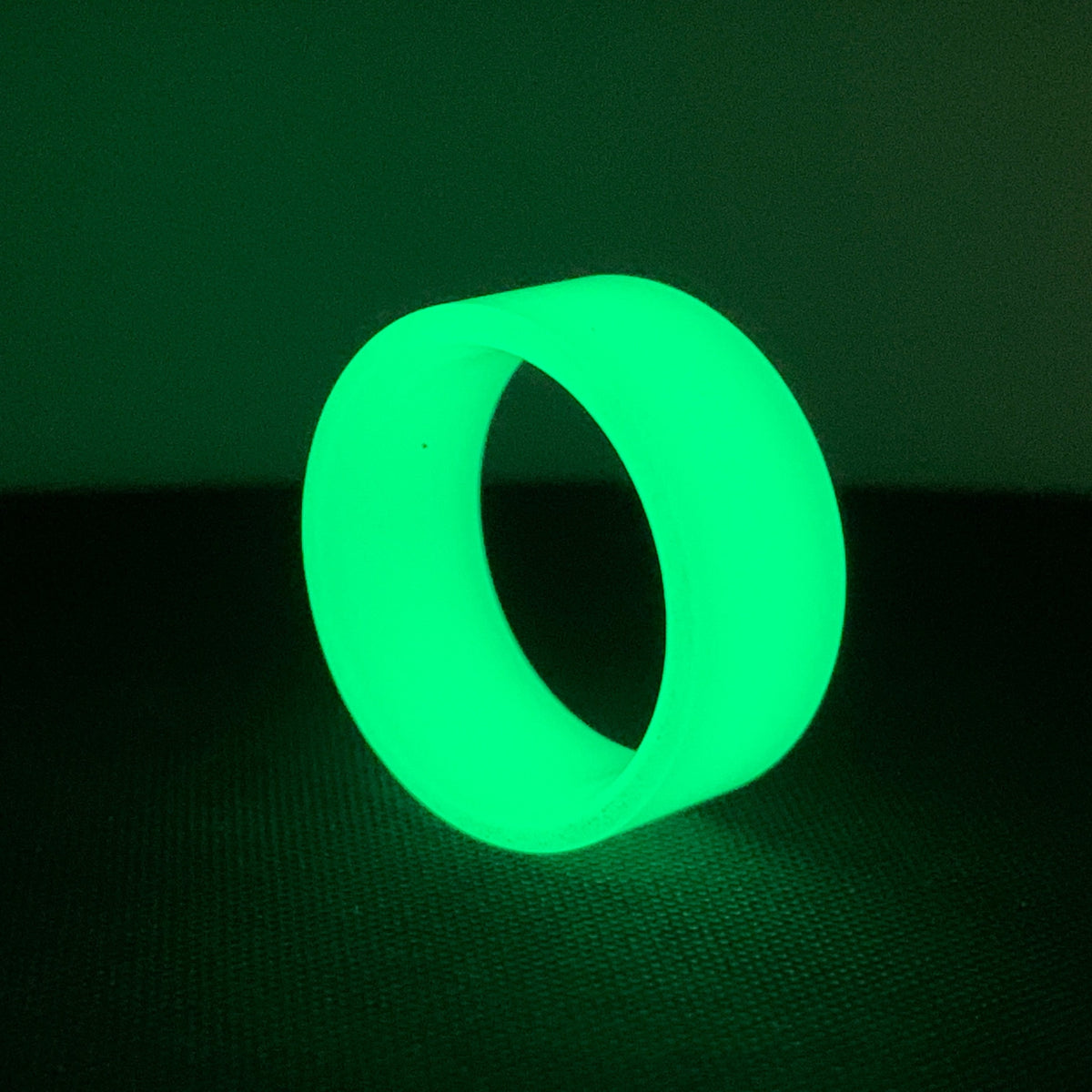 Green Glow Ring made entirely from proprietary glow polymer.