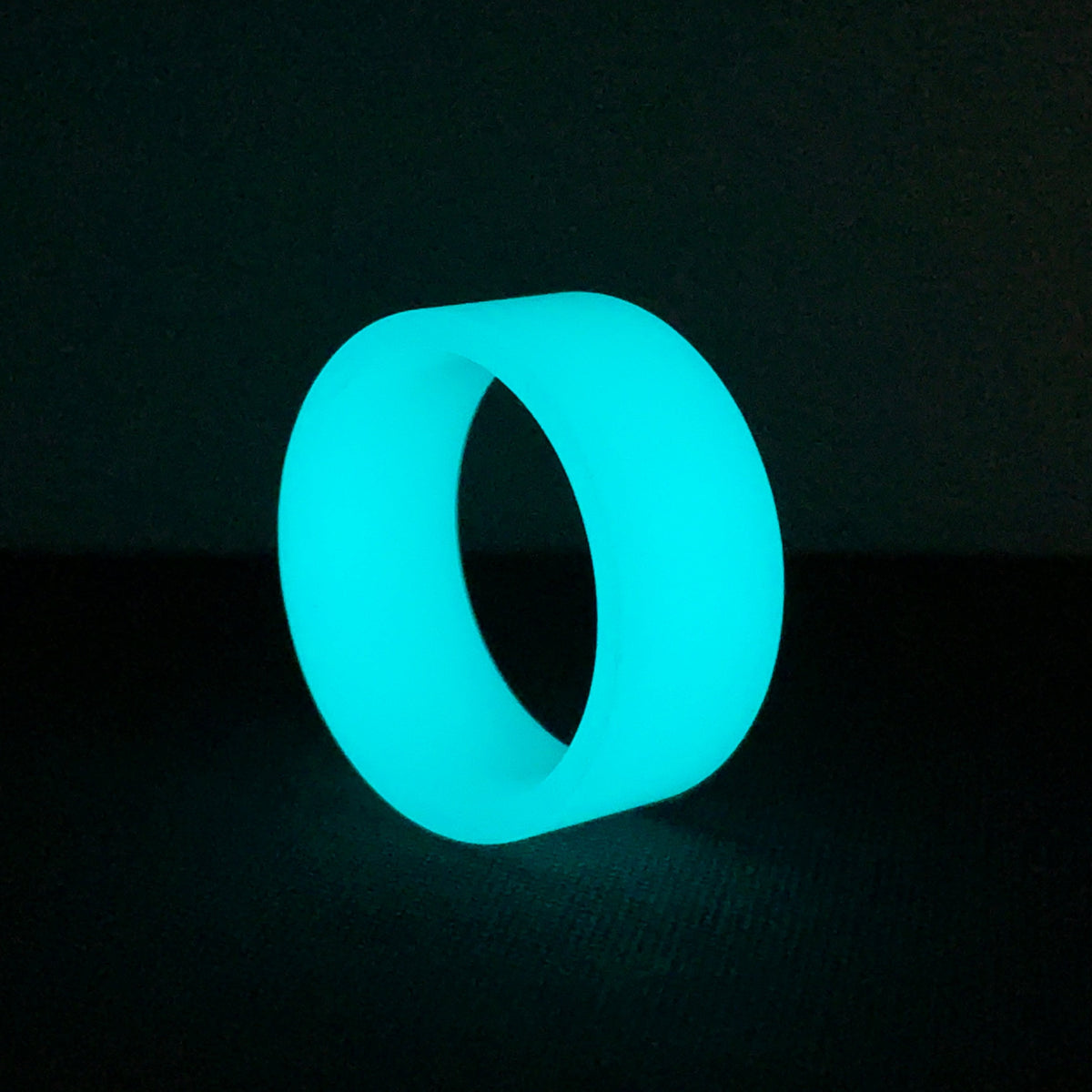 Turquoise Glow Ring made entirely from proprietary glow polymer.