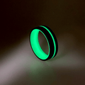 Green Glow Ring with Forged Carbon Fiber exterior and a center glow stripe.